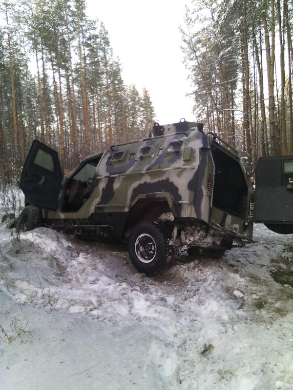 koguar Destroyed Ukrainian armoured car KRAZ Cougar in Kolesnikovka, december 2014 ПАО АвтоКрАЗ