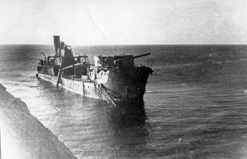 Destroyed gunboat Krasnaya Gruziya at Black sea in 1943, WWII photo. She was grounded and lost on 28 February 1943 after being hit by torpedo during an attack by German motor torpedo boats S-28, S-51, S-72 and S-102 in Black Sea. The wreck was later finished by German artillery and aircraft. It was the heaviest loss of the Soviet Navy due enemy surface attack in Black Sea (during the assault were also lost a minesweeper and a tug)