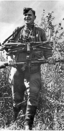 Soviet soldier with the captured weapon