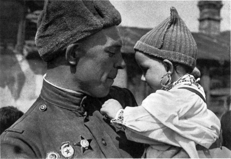 Soviet WWII soldier and Czeh child