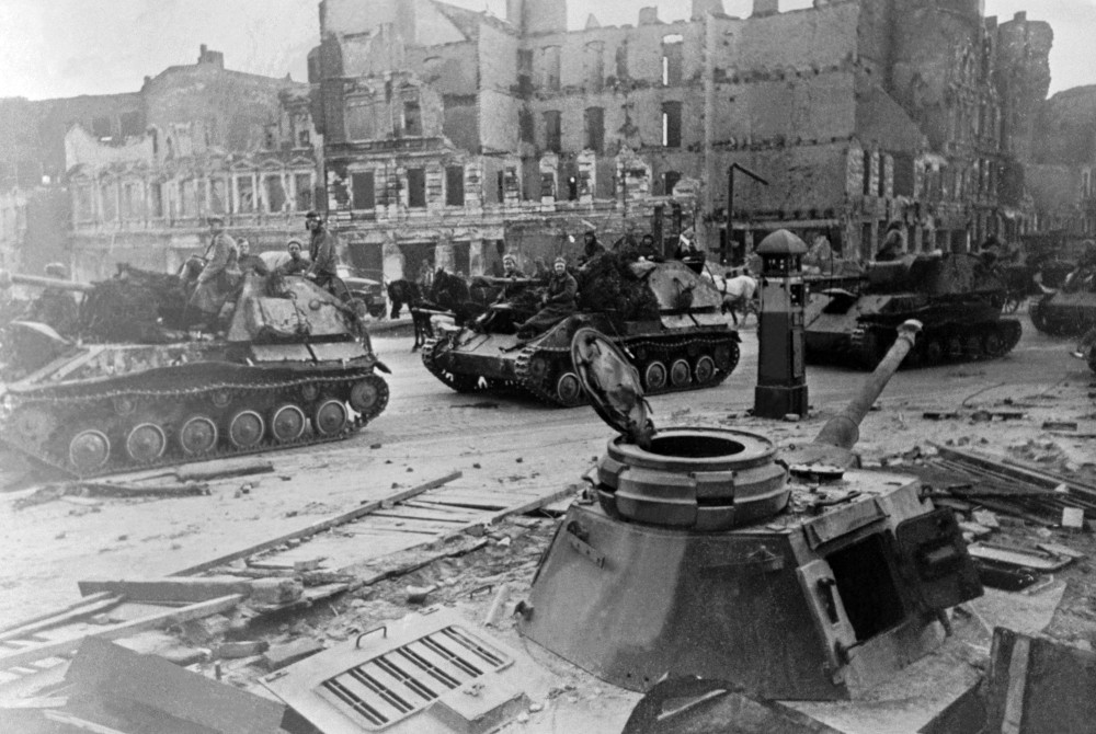 SU-76M column near the German panzer Pz.Kpfw.IV in Berlin  WWII photo