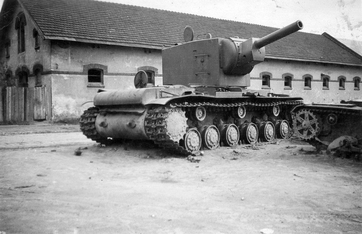 foto WWII USSR  armored fighting vehicle Russian tanks KV2 and disabled HT26 in Lvov