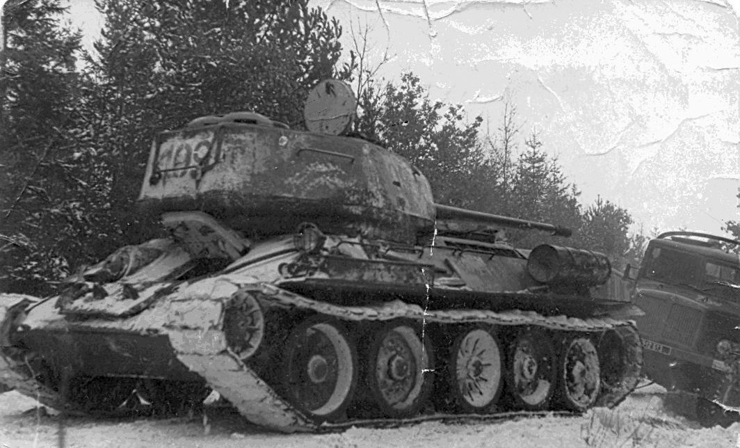 Soviet tank medium T-3485 is towung the truck